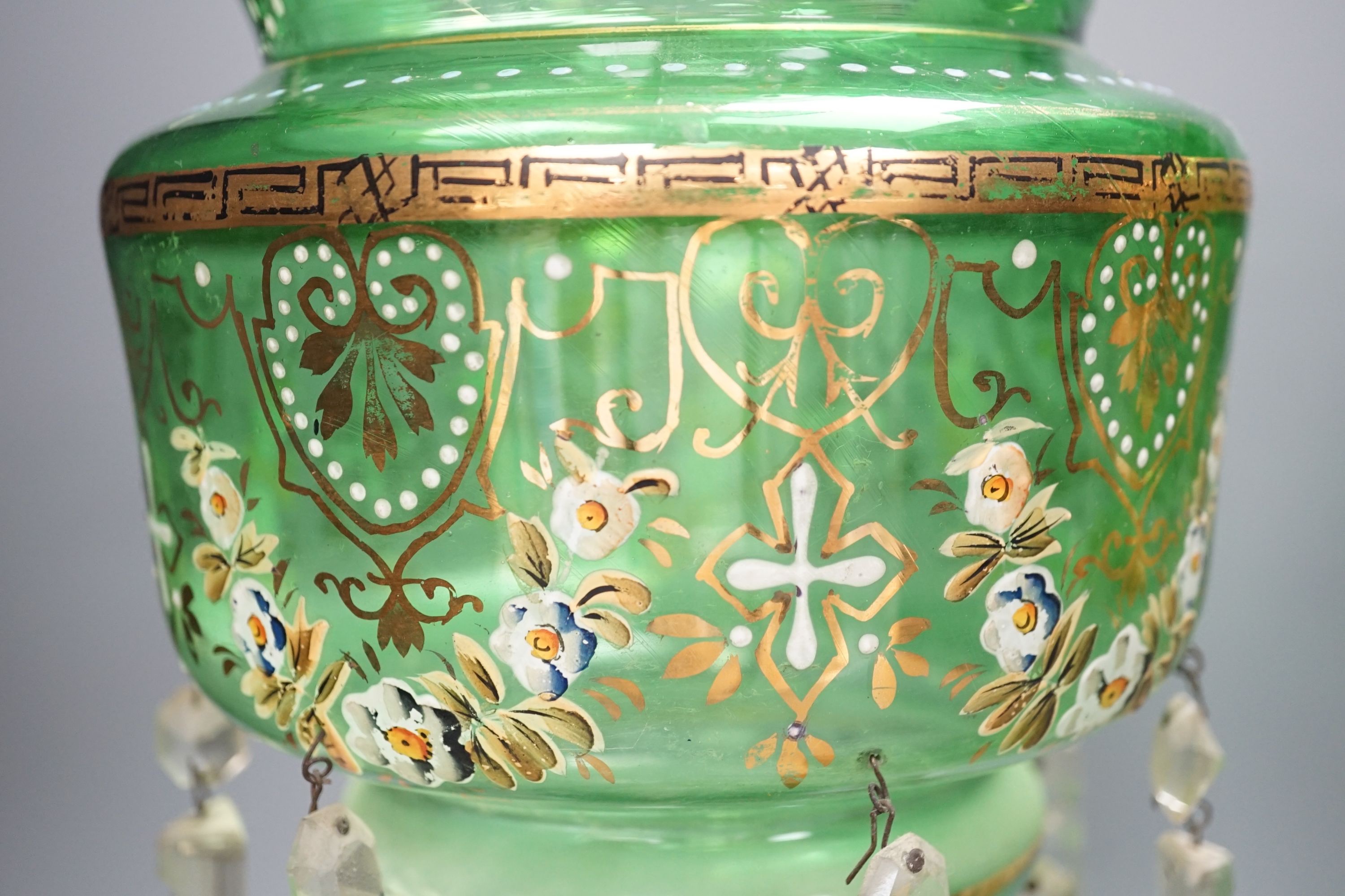 A pair of late 19th century green glass enamel lustres - 37cm high